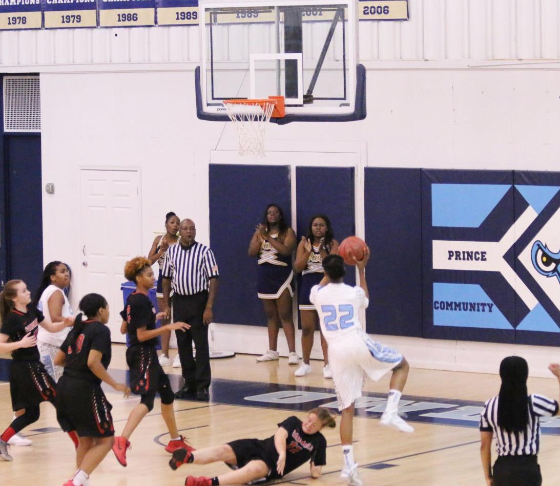 Lady Owls Cruise to Victory over Cardinals